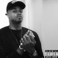 a man in a black hat is holding his hands up